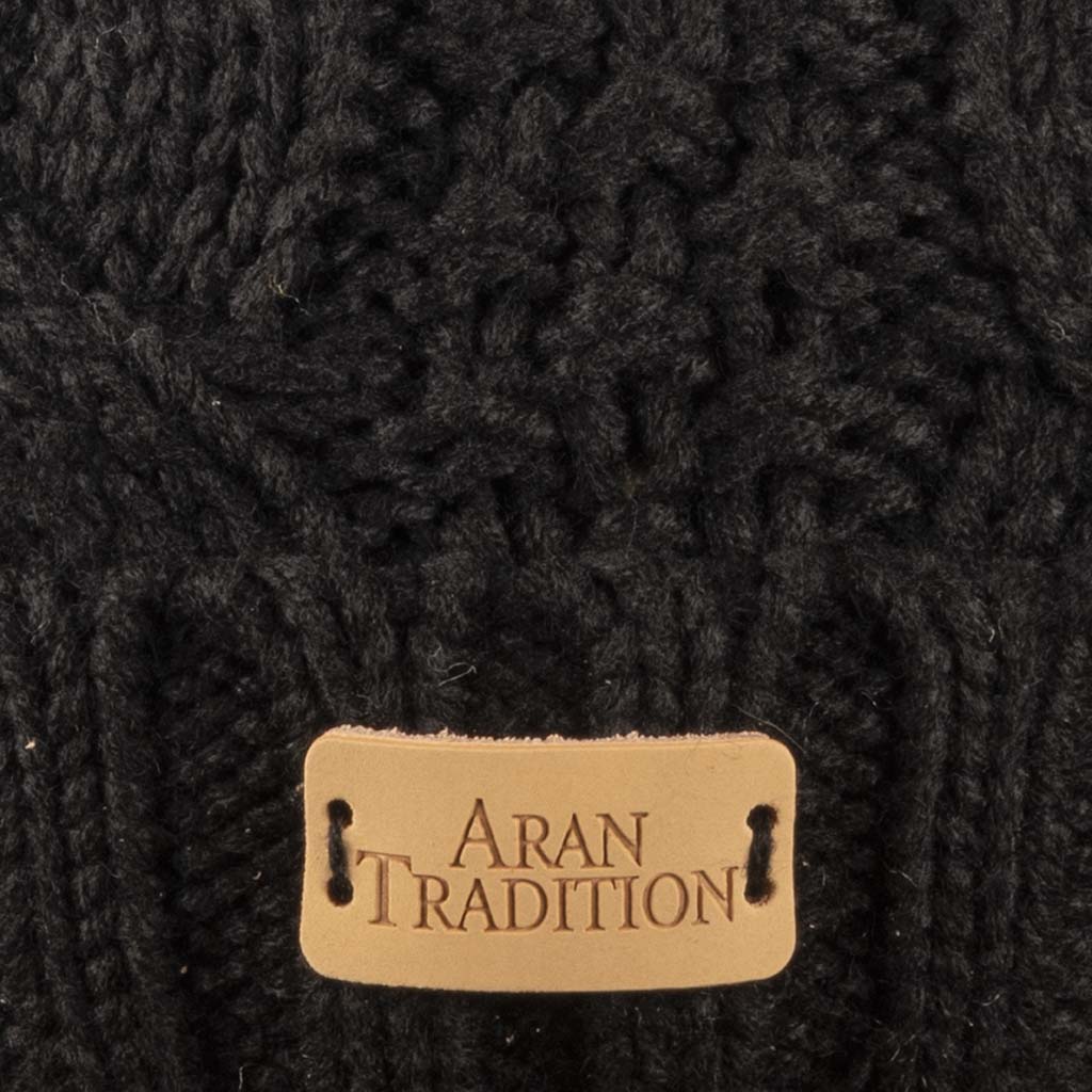 Stay Cozy & Chic with Aran Cable Pom Pom Hat | Traditional Cable Knit