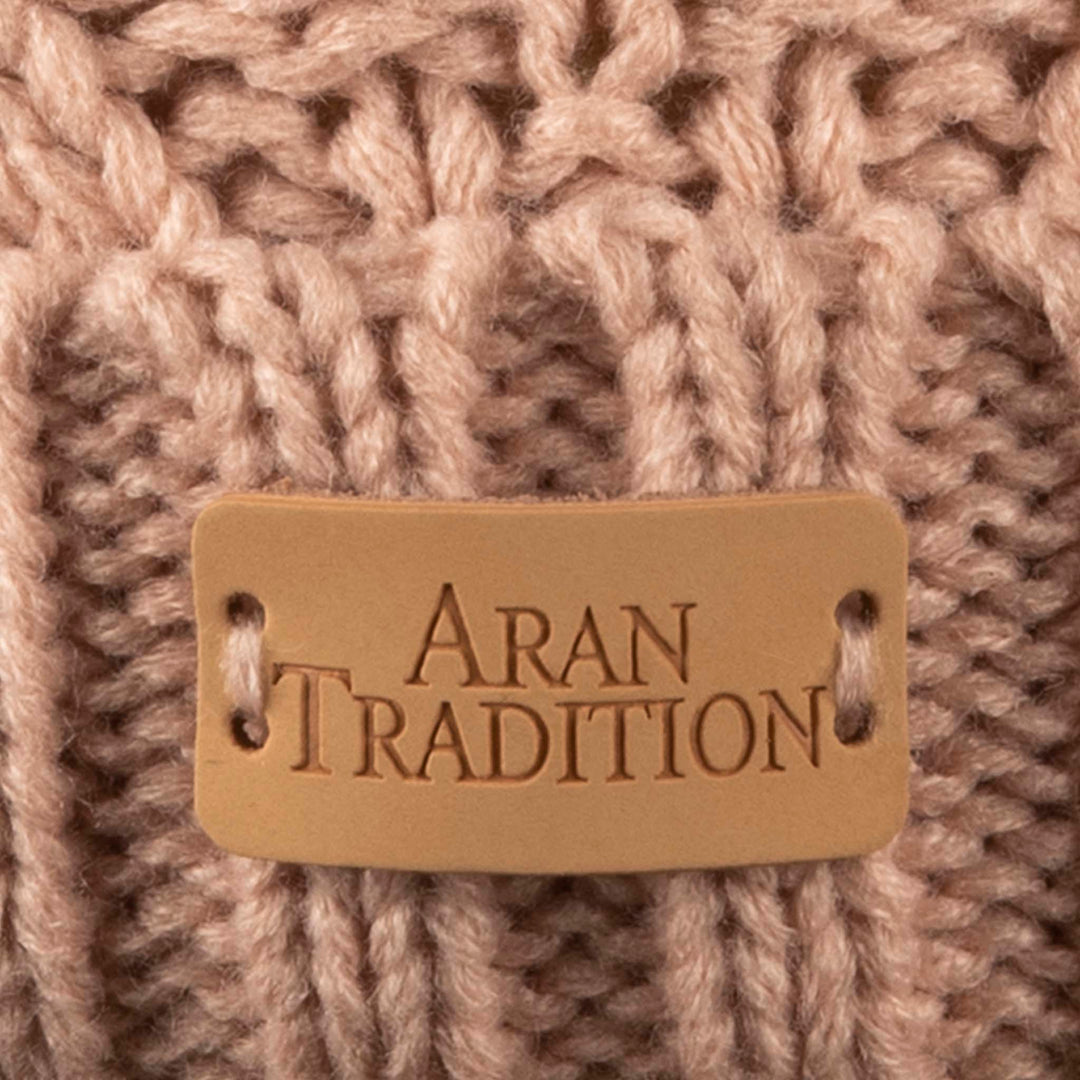 Stay Cozy & Chic with Aran Cable Pom Pom Hat | Traditional Cable Knit