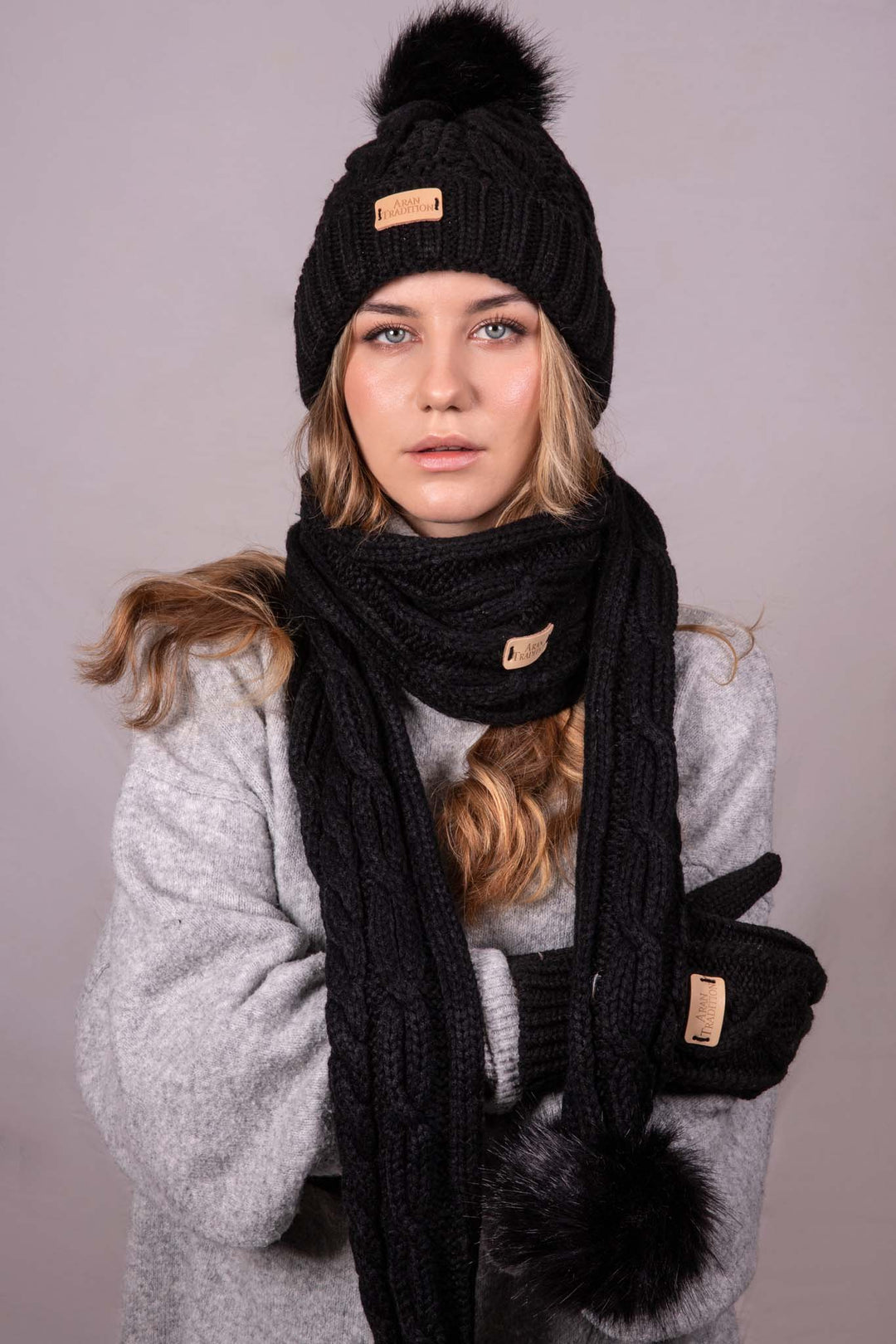 Stay Cozy & Chic with Aran Cable Pom Pom Hat | Traditional Cable Knit