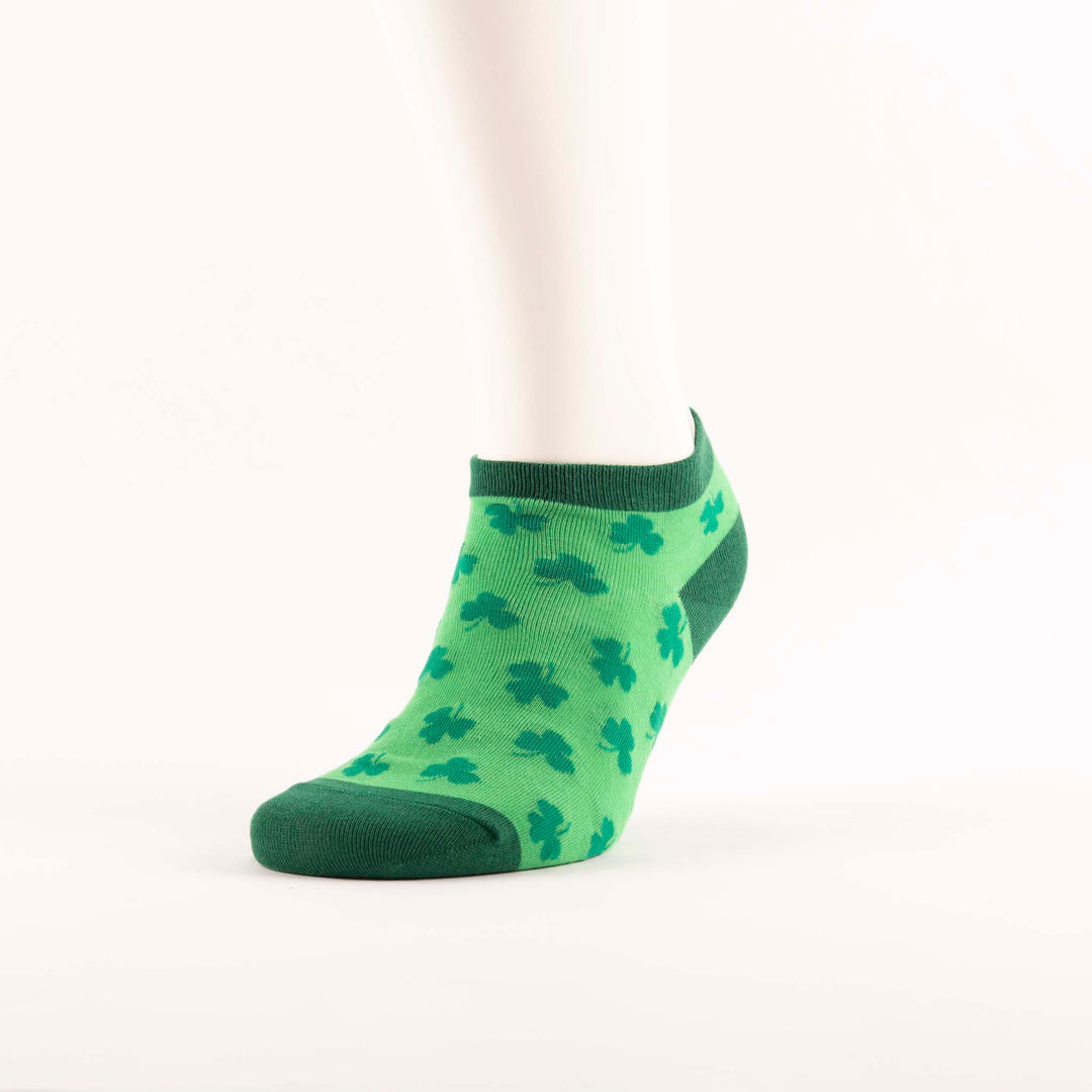 pale green socks with dark green trim and mid green shamrocks on foot